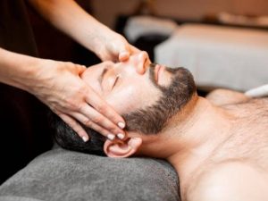 bearded client feel relaxed while deep tissue massage venice