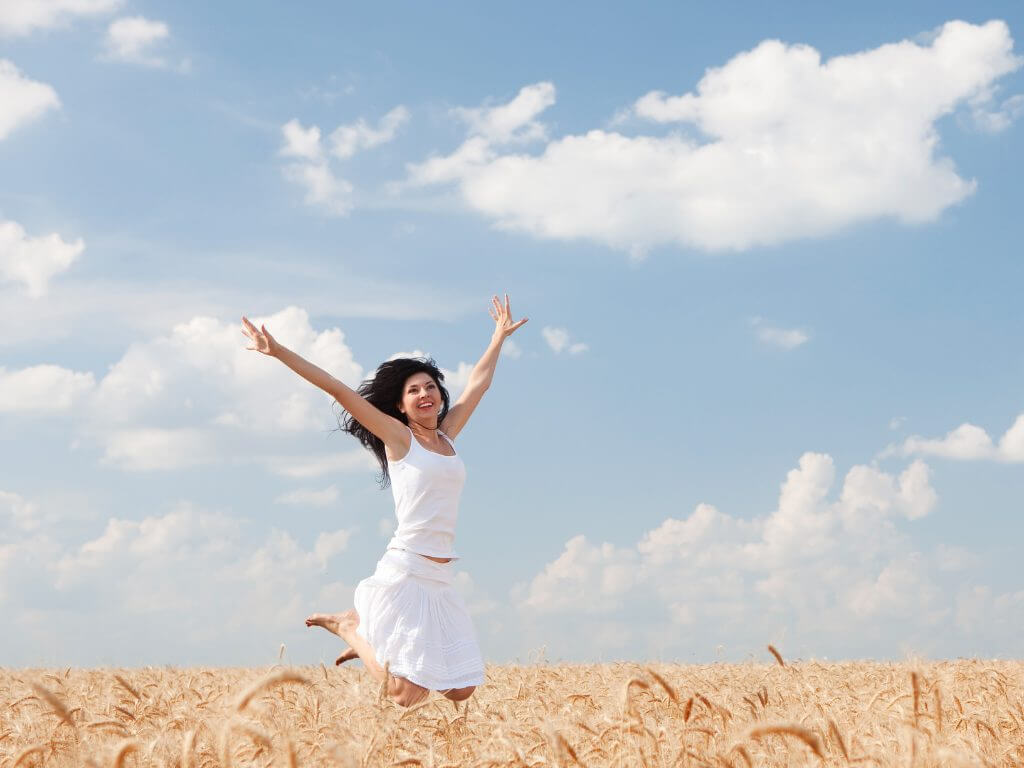 happy woman jumping on air personal development venice