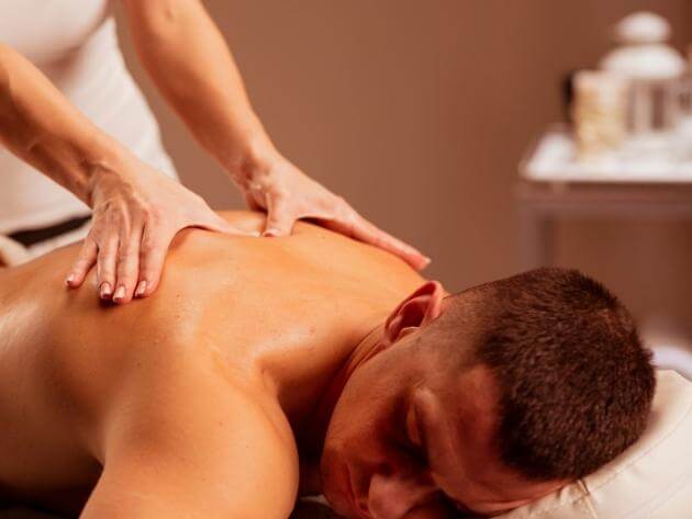 Male Massager Therapist Doing Therapeutic Back Massage Ot Client