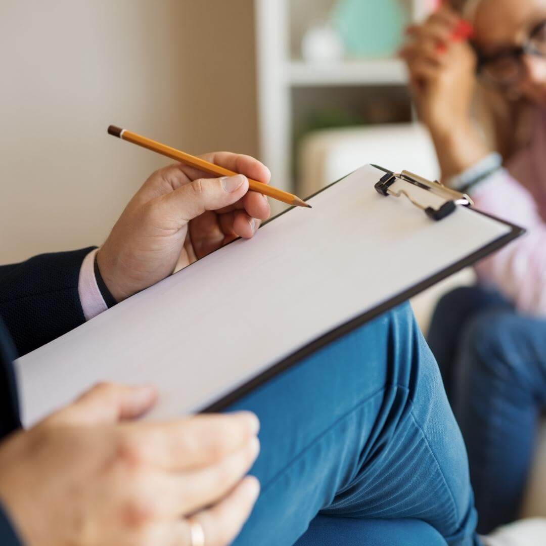 man hand holding a pencil therapy and counseling venice