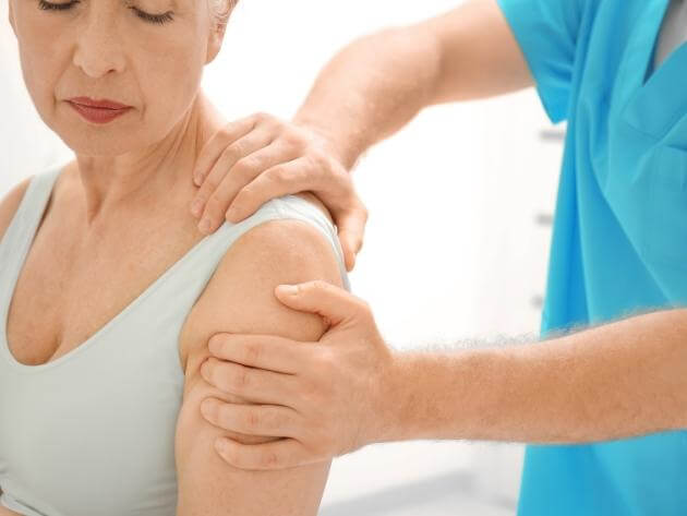 masseur doing a medical massage to a client in venice