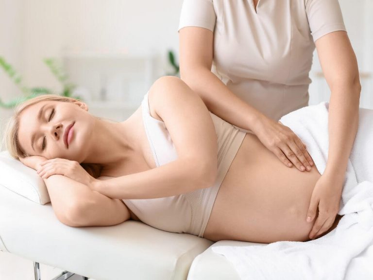 pregnant woman lying on her side prenatal massage venice