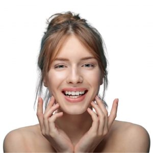 woman with her hands on her cheeks smiling juvederm treatment venice