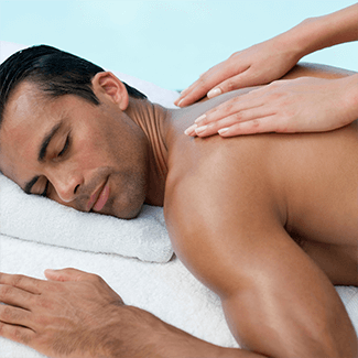 man relaxing while receiving medical massage in venice